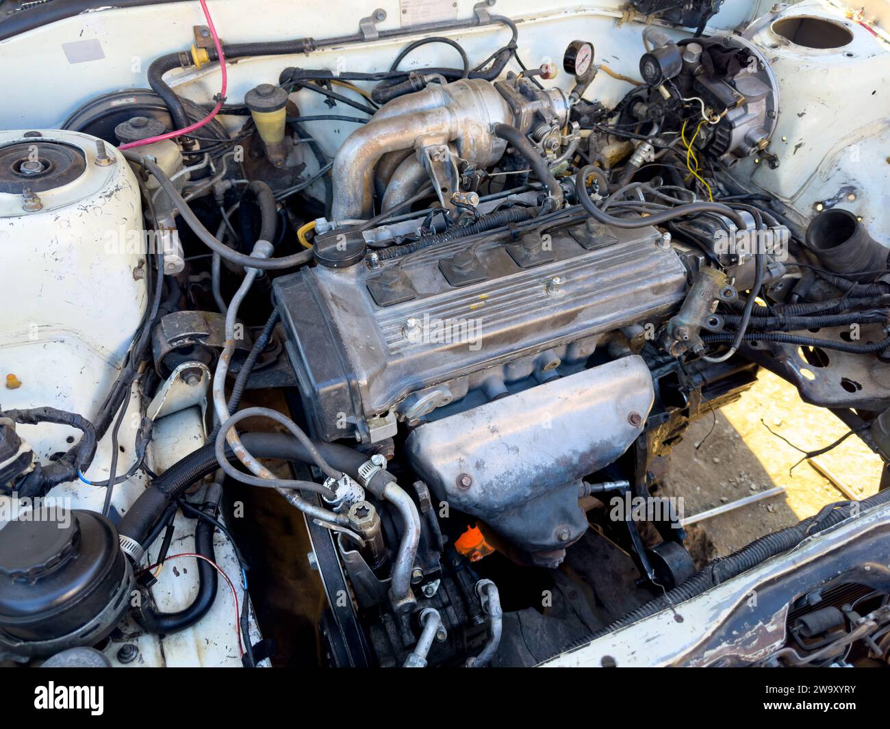 Old model japanese car engine closeup Stock Photo Alamy