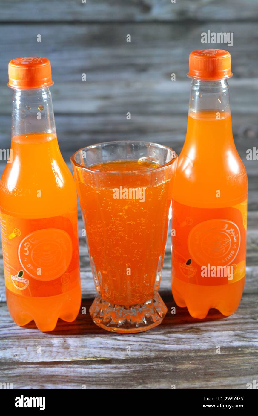 Cairo, Egypt, December 25 2023: Spiro Spathis mandarin orange soda drink, Spiro Spathis Company was established in 1920 by Greek Foreigner SpiroSpathi Stock Photo