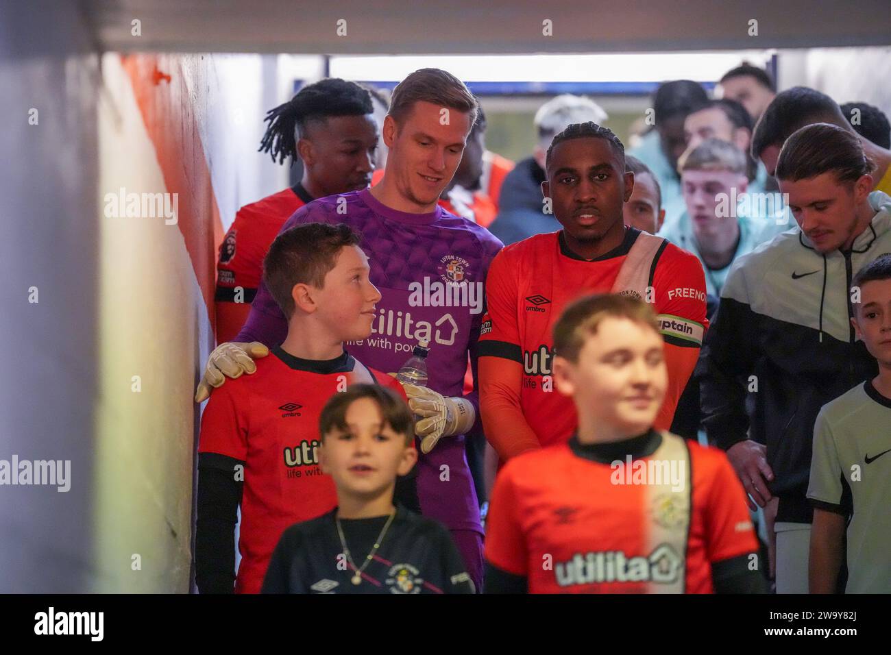Luton, UK. 30th Dec, 2023. Players line up in the tunnel ahead of the