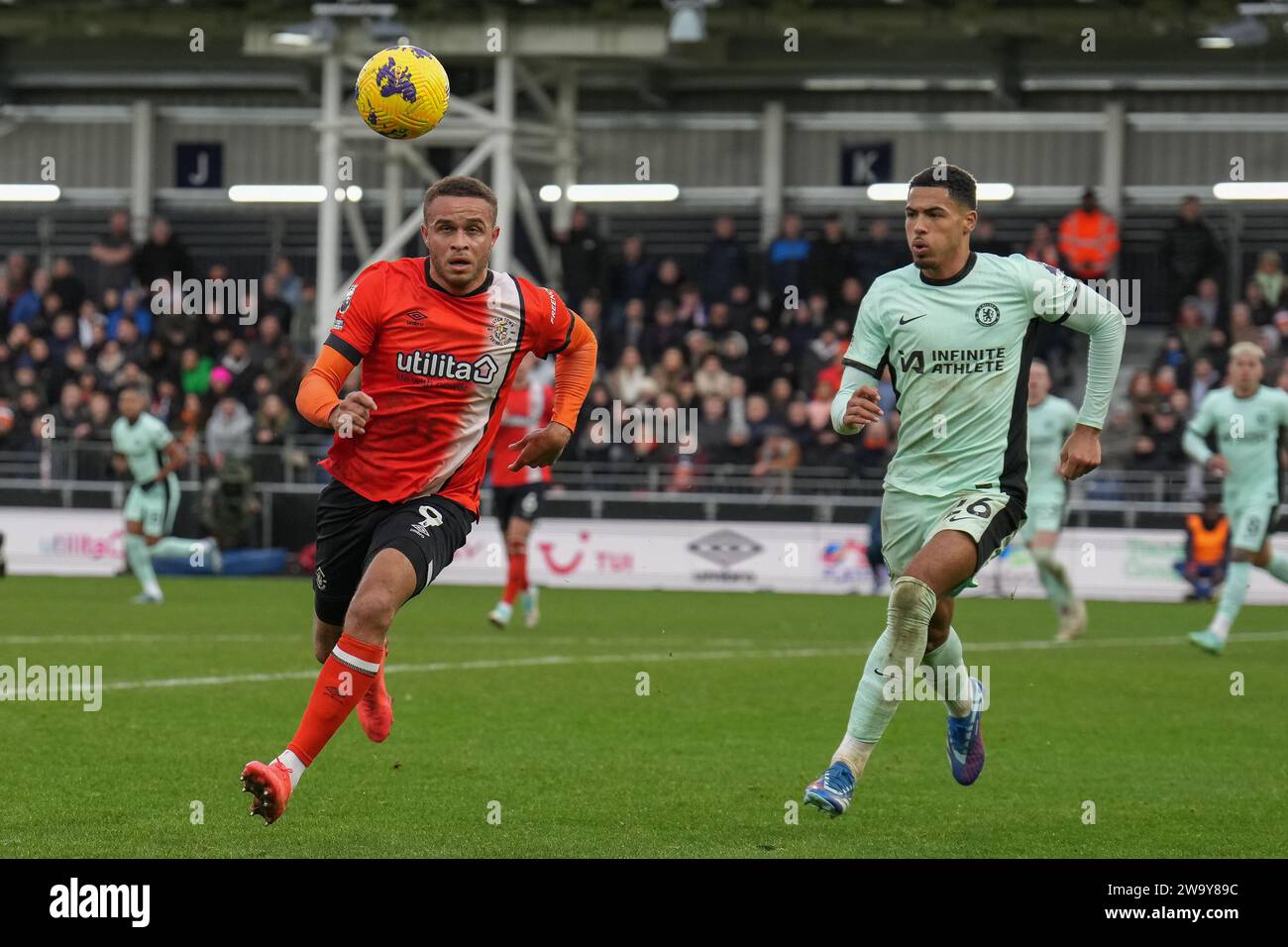 Luton, UK. 30th Dec, 2023. Carlton Morris (9) of Luton Town and Levi