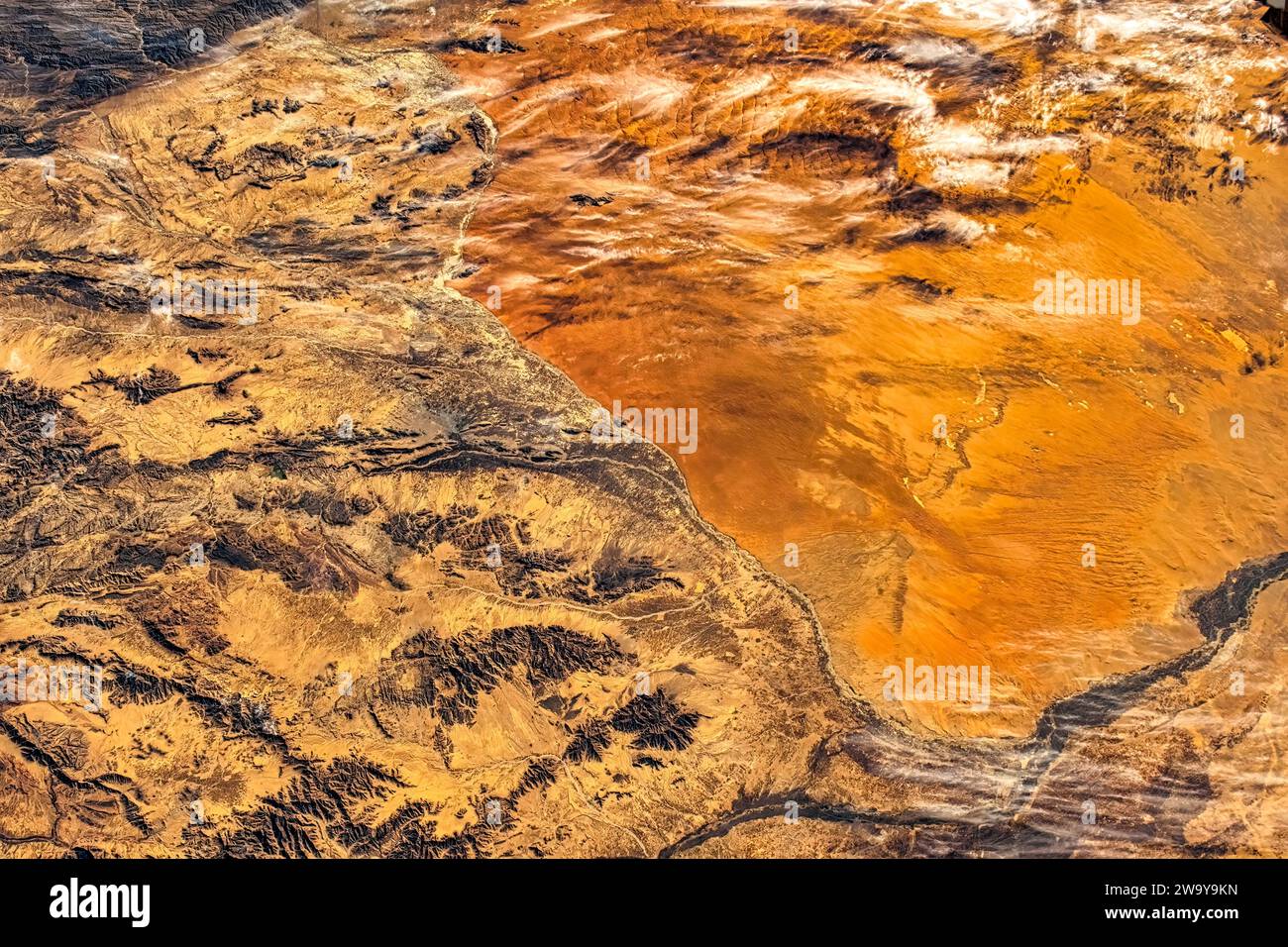 Desert Land Beauty in Afghanistan. Digital enhancement of a NASA image. Stock Photo