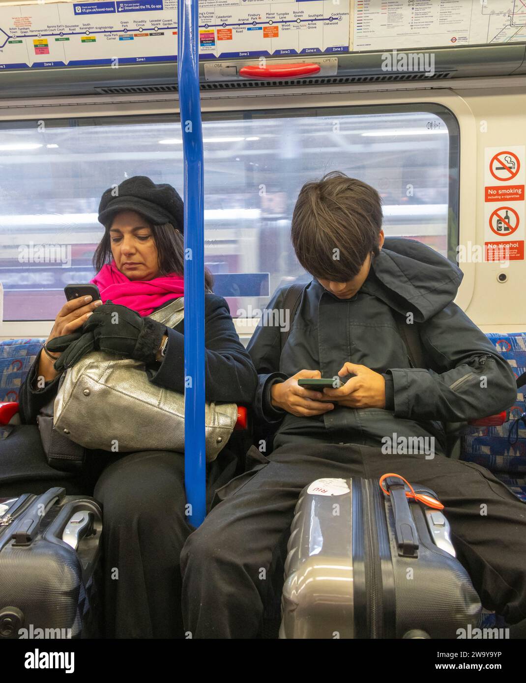 passengers on London underground train Stock Photo