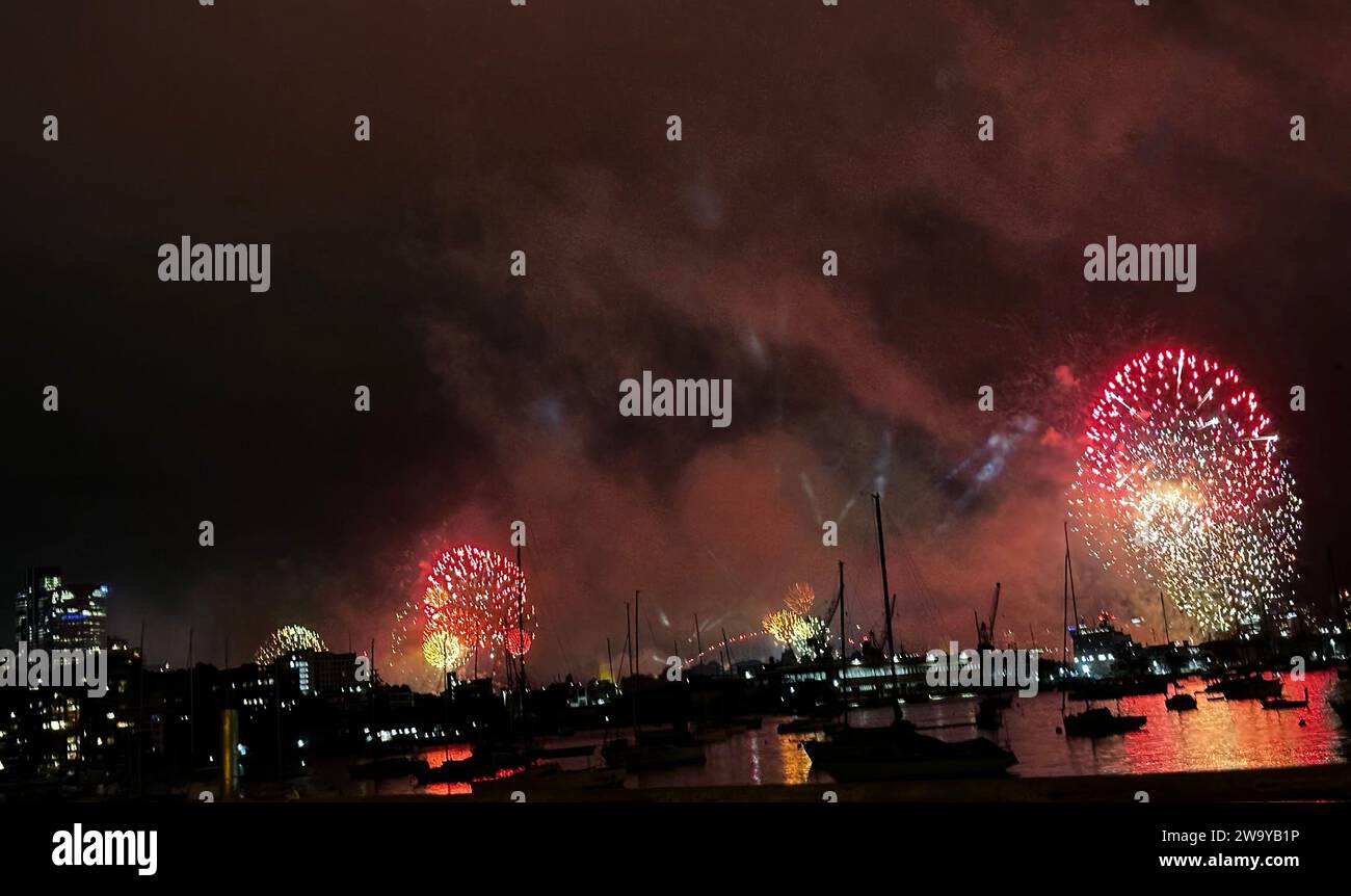 Non Exclusive: More than a million people have packed the Sydney Harbour foreshore to begin one of the world's best-known New Year's Eve celebrations. Stock Photo