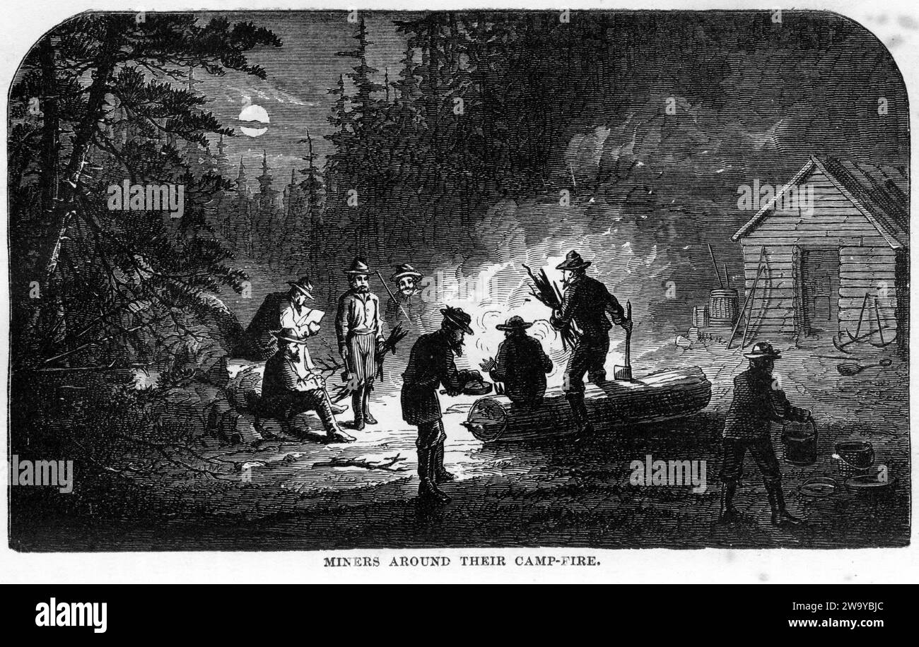 Engraving of gold miners around their campfire, from The Underground World, circa 1878 Stock Photo