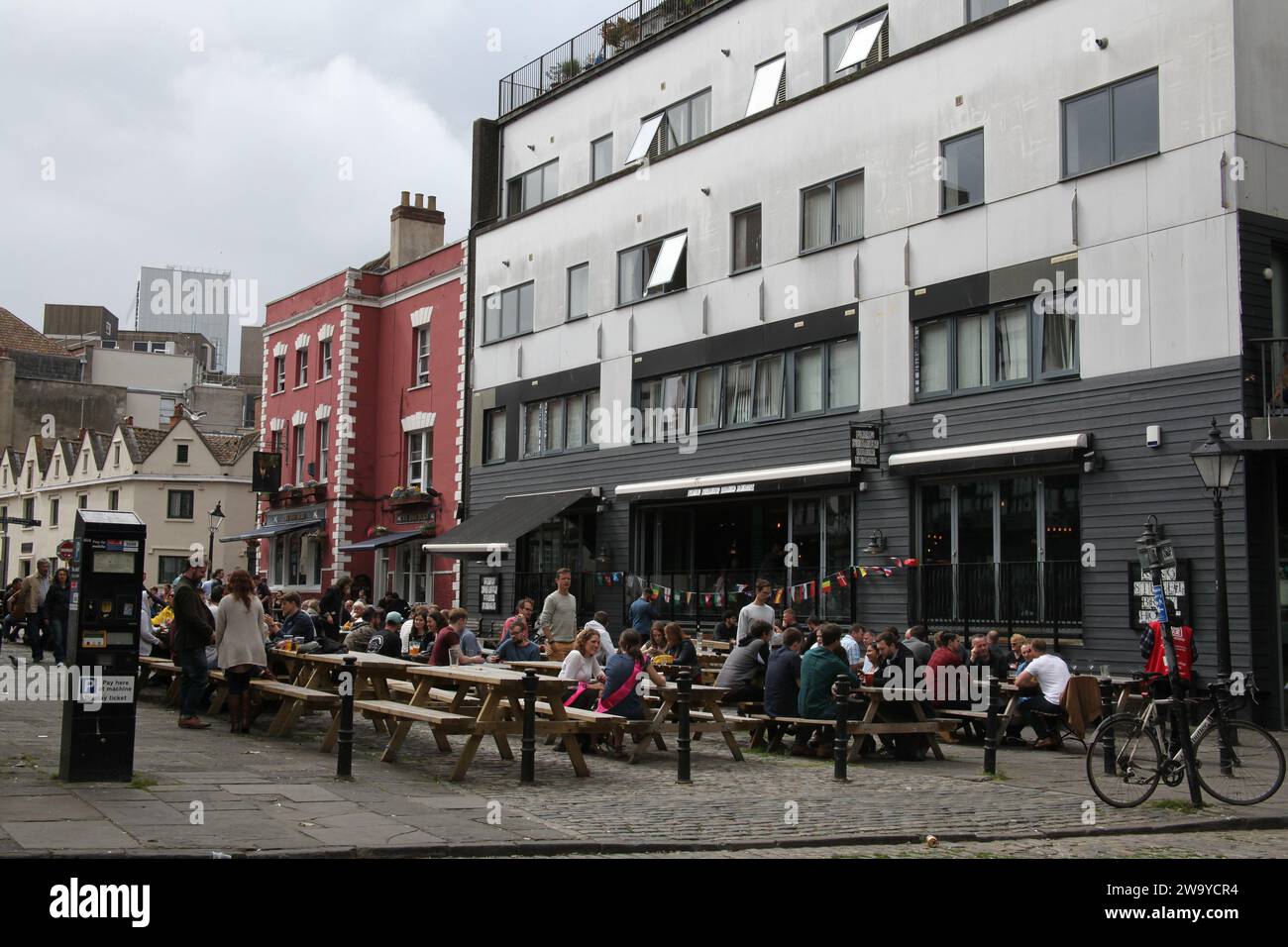 Bristol, Somerset, UK 06 16 2018 People socializing together at a riverside bar in Bristol Stock Photo