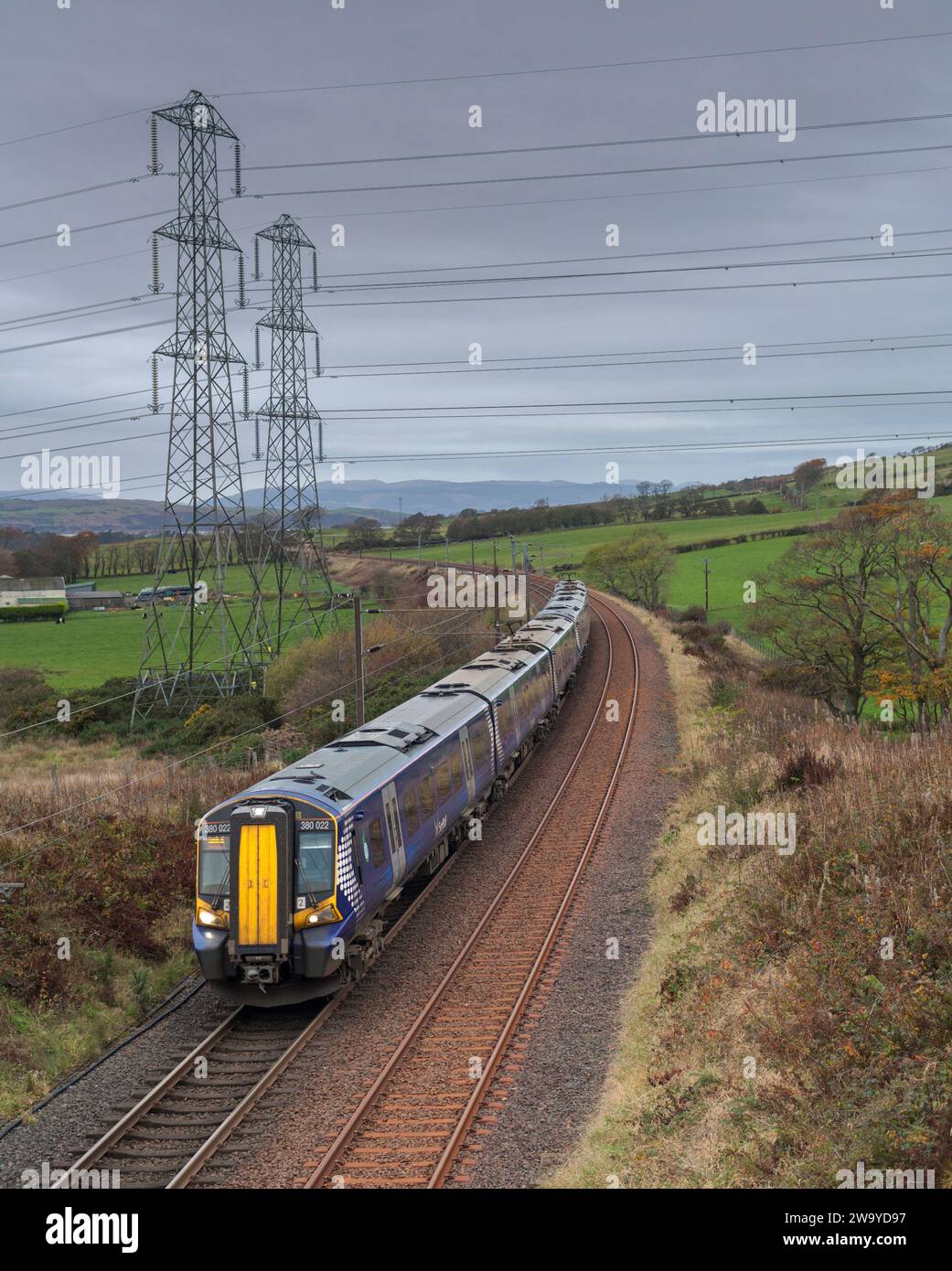 Scotrail class 380 electric trains passing the Ayrshire countryside near West Kilbride, Scotland, UK Stock Photo