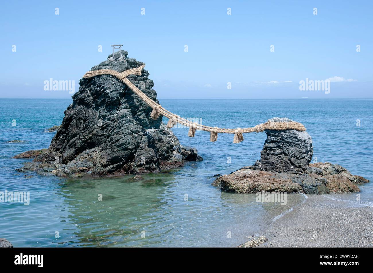 The Meoto Iwa, also known as the wedded rocks, at Futami Okitama Shrine in Ise, Mie Prefecture, Japan. The Meoto Iwa symbolise a married couple. Stock Photo