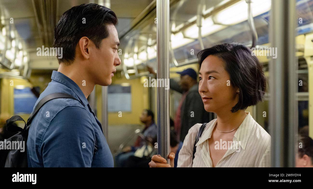Past Lives (2023) directed by Celine Song and starring Greta Lee, Teo Yoo and John Magaro. Nora and Hae Sung, two deeply connected childhood friends, are wrested apart after Nora's family emigrates from South Korea. Twenty years later, they are reunited for one fateful week as they confront notions of love and destiny. Publicity photograph ***EDITORIAL USE ONLY***. Credit: BFA / A24 Stock Photo