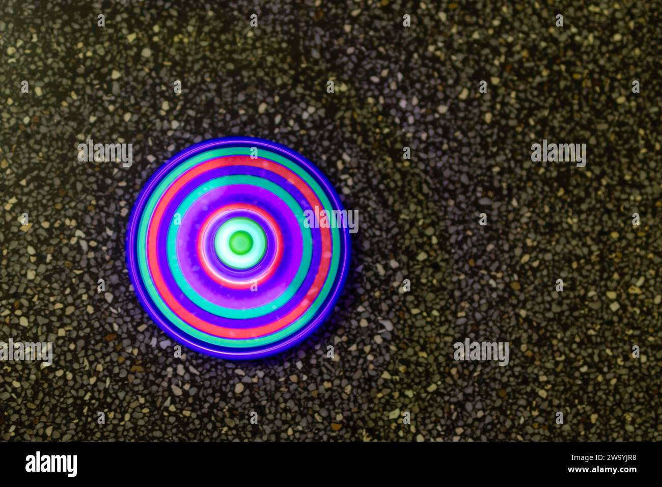 illusion maker of colorful light with blurred motion Stock Photo