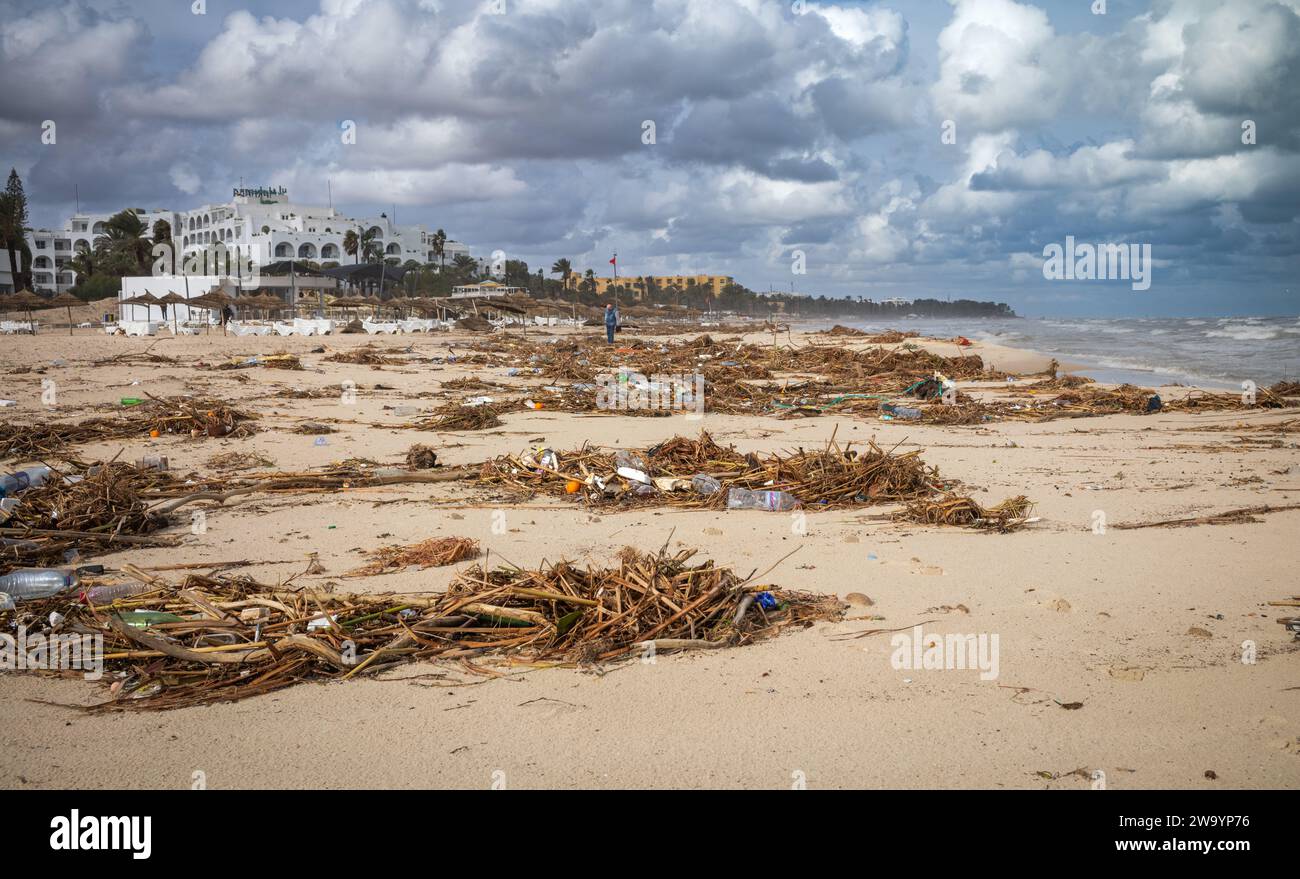 Plastic, general rubbish and other detritus strewn across Samara Beach in front of all-inclusive resorts in Sousse, Tunisia. Stock Photo