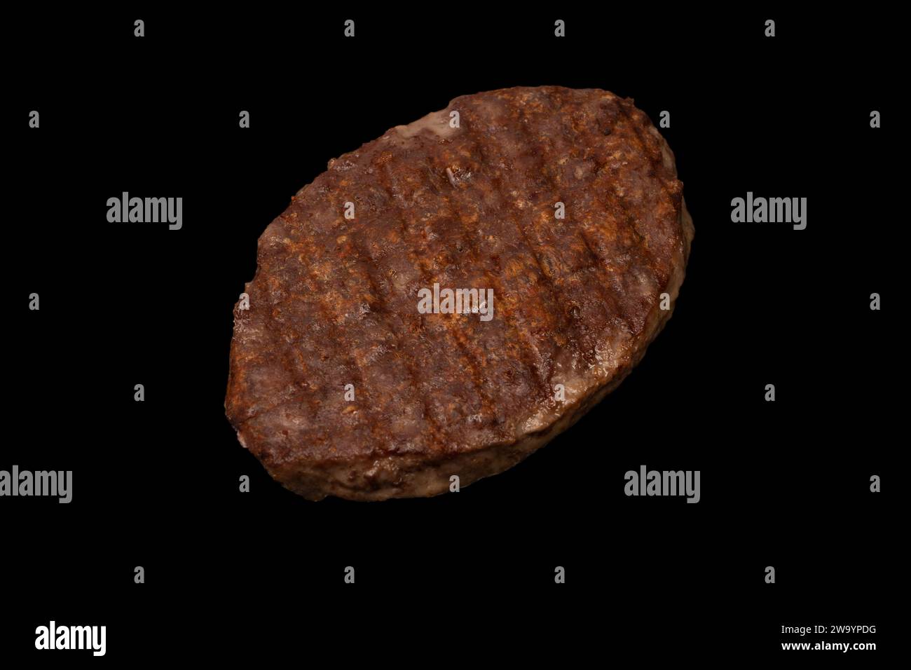 Cutlet with minced beef isolated on a black background. Stock Photo
