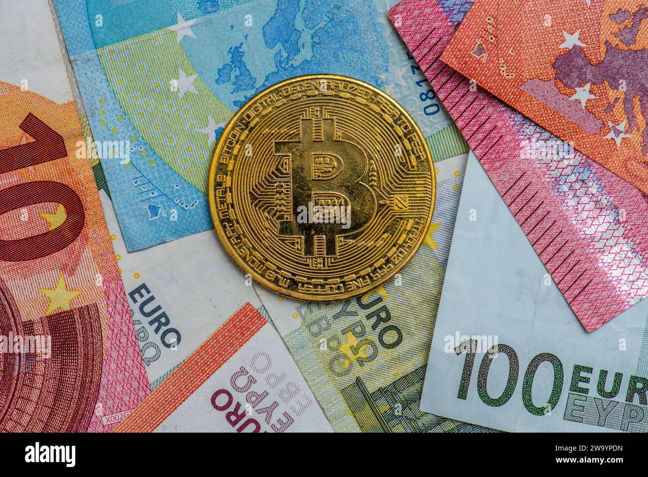Gothenburg, Sweden - April 30 2022: Shiny golden Bitcoin placed on Euro  notes Stock Photo - Alamy