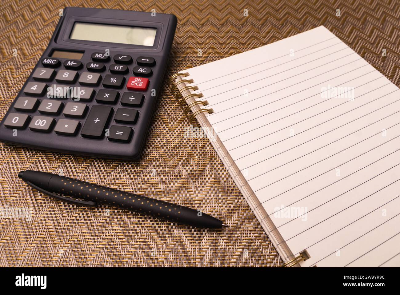 Empty notepad with a pen and calculator mockup accounting economy