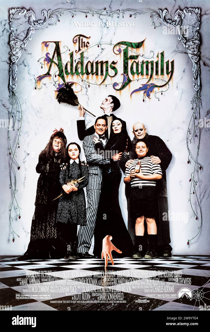 The Addams Family (1991) directed by Barry Sonnenfeld and starring Anjelica Huston, Raul Julia and Christopher Lloyd. Big screen outing for Charles Addams' much loved characters. Con artists plan to fleece an eccentric family using an accomplice who claims to be their long-lost uncle. Photograph of an original 1991 US one sheet poster ***EDITORIAL USE ONLY***. Credit: BFA / Paramount Pictures Stock Photo