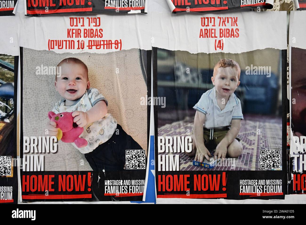 A closeup of photos of Israeli hostage brothers, Kfir Bibas, ten