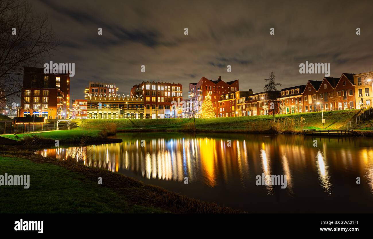 Scenic night view of illuminated buildings in the center of Waddinxveen, Netherlands Stock Photo