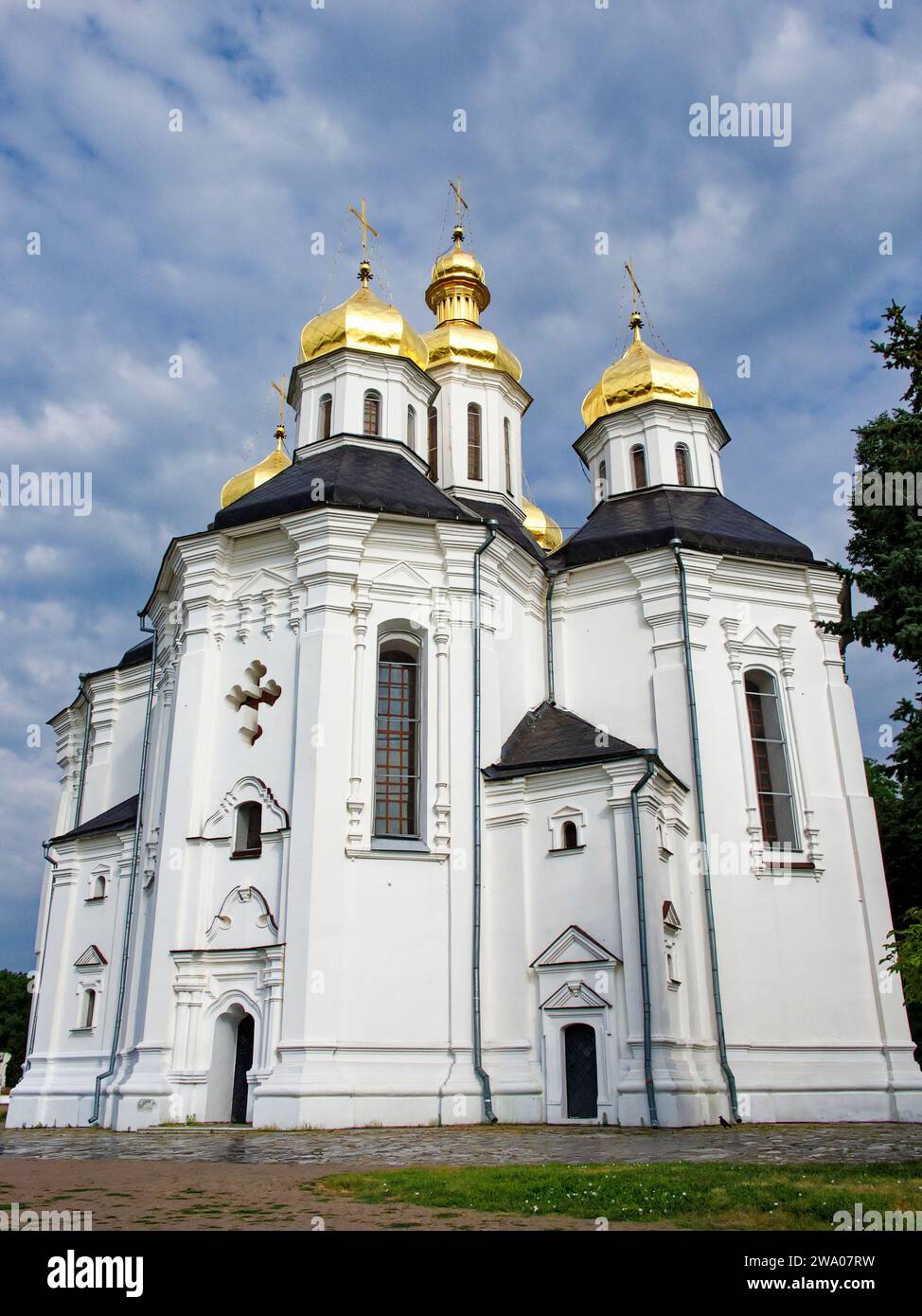 In this picturesque moment, Catherine's Church, a splendid example of Ukrainian Baroque architecture, graces the landscape with its iconic white facad Stock Photo