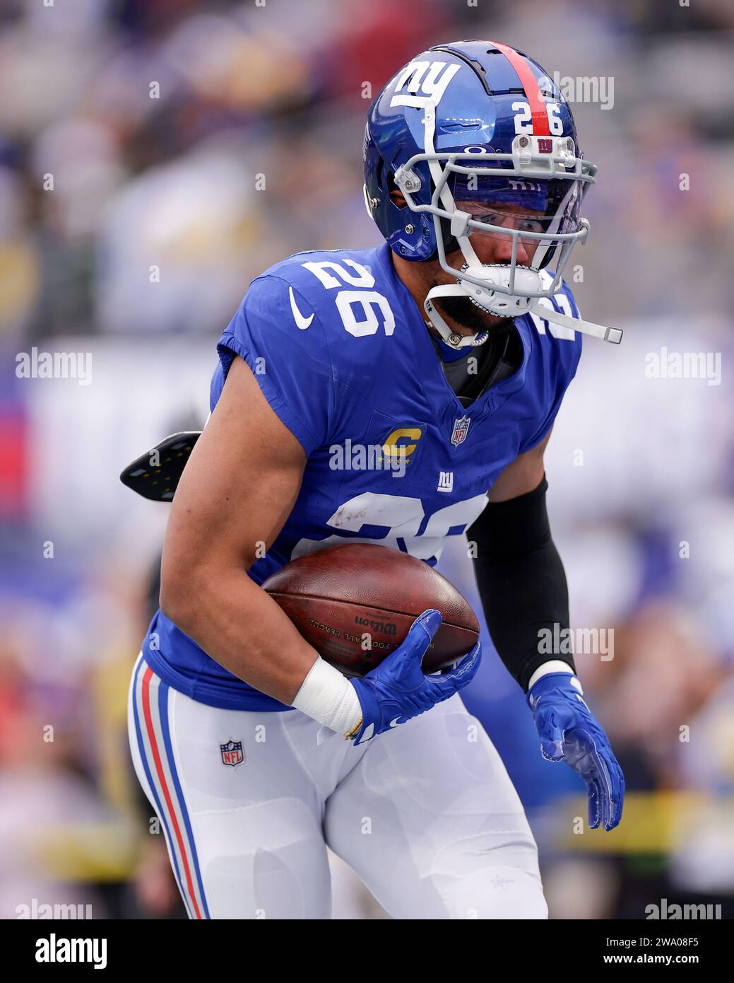 New York Giants running back Saquon Barkley (26) runs a drill during