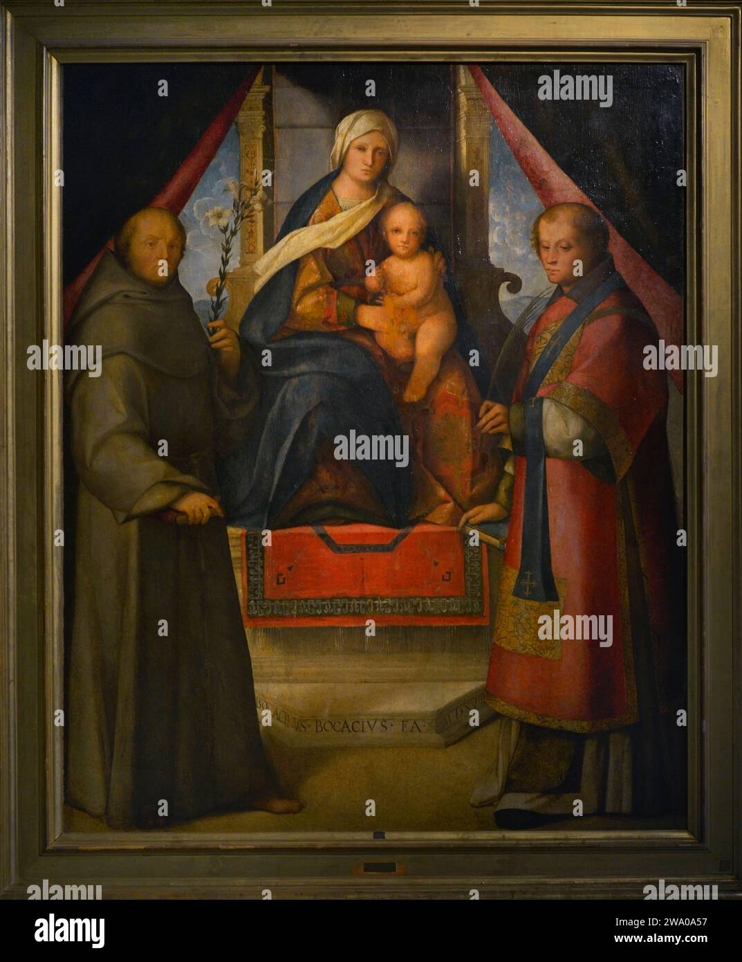 Boccaccio Boccaccino (c. 1466-1525). Italian painter. The Virgin and Child Enthroned between Saint Vincent and Saint Anthony of Padua, 1518. Tempera (panel transferred to canvas). From the church of San Vincenzo, Cremona. Museo Civico Ala Ponzone. Cremona. Italy. Stock Photo