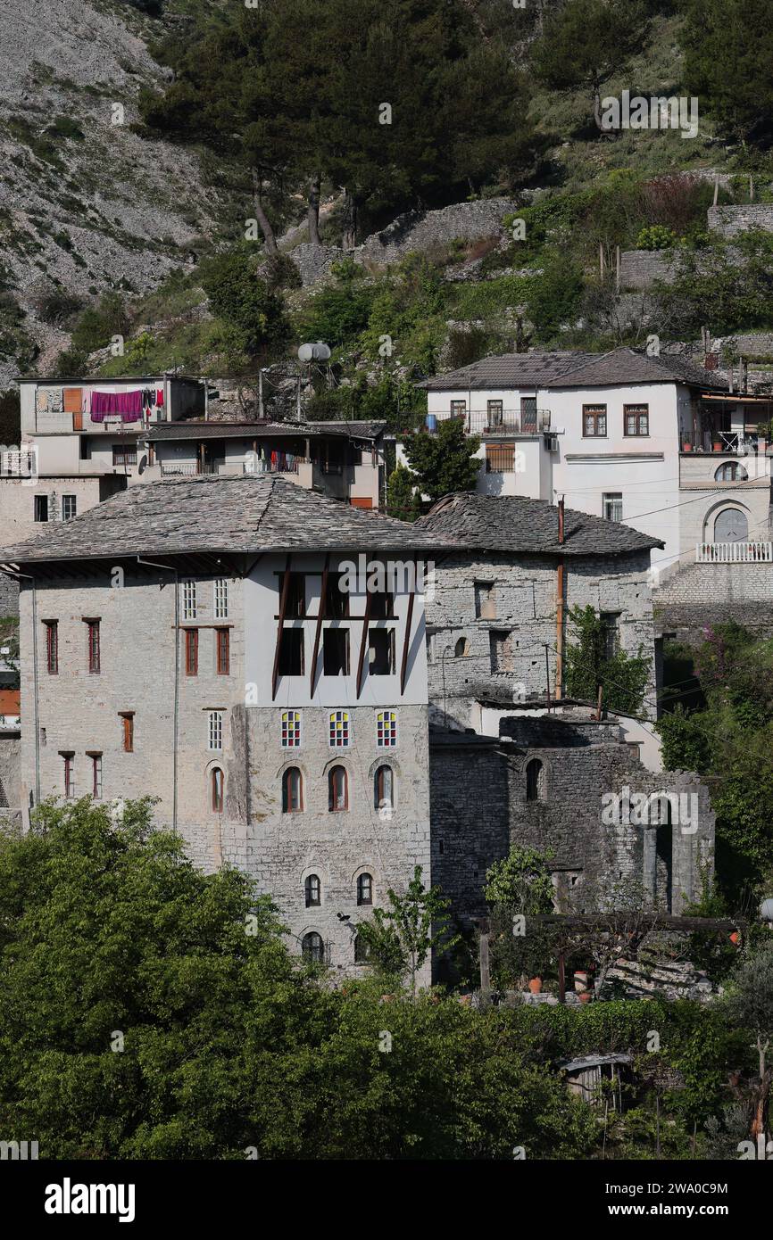 193 Ottoman-style dwellings made of stone on the slope down the hill facing the citadel from the southwest. Gjirokaster-Albania. Stock Photo