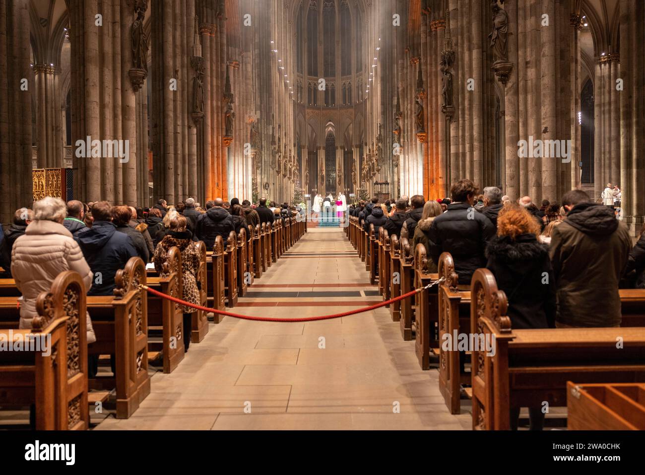 Cologne, Germany. 31st Dec, 2023. The faithful celebrate the endof
