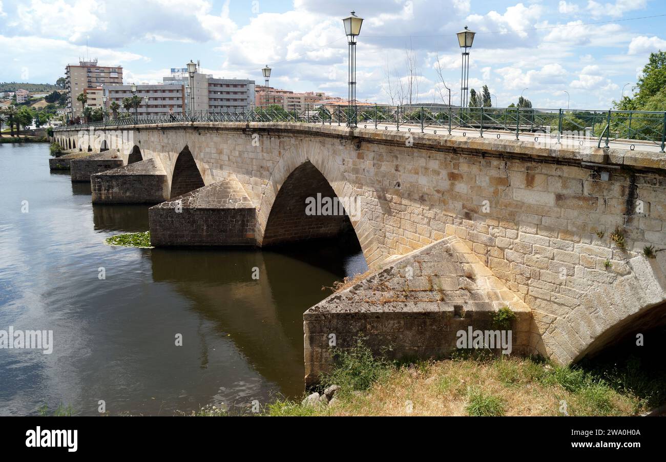 Old Bridge, Ponte Velha, across Tua river, Romanesque-style bridge, built around the turn of 15th and 16th centuries, Mirandela, Portugal Stock Photo
