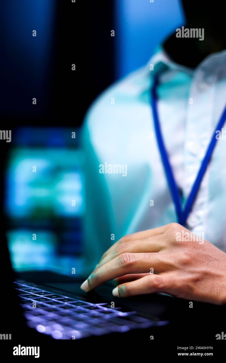 Data center admin using artificial hi-res stock photography and images ...