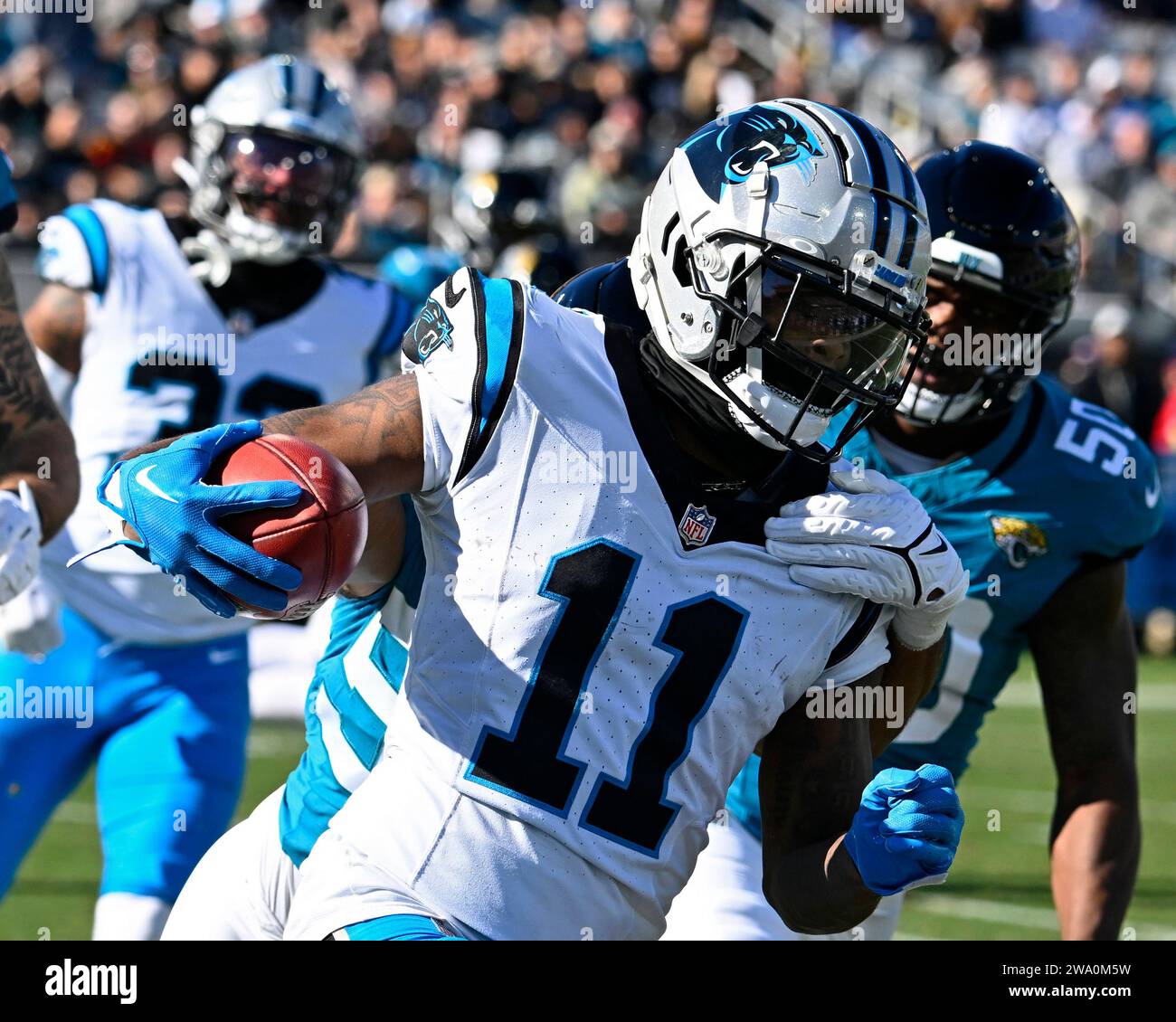 Jacksonville, United States. 31st Dec, 2023. Carolina Wide Receiver Ihmir Smith-Marsette runs for short yardage after making a reception in the third quarter as the Panthers compete against the Jaguars at the EverBank Stadium in Jacksonville, Florida on Sunday, December 31, 2023. The Jaguars defeated Carolina 26-0. Photo by Joe Marino/UPI. Credit: UPI/Alamy Live News Stock Photo