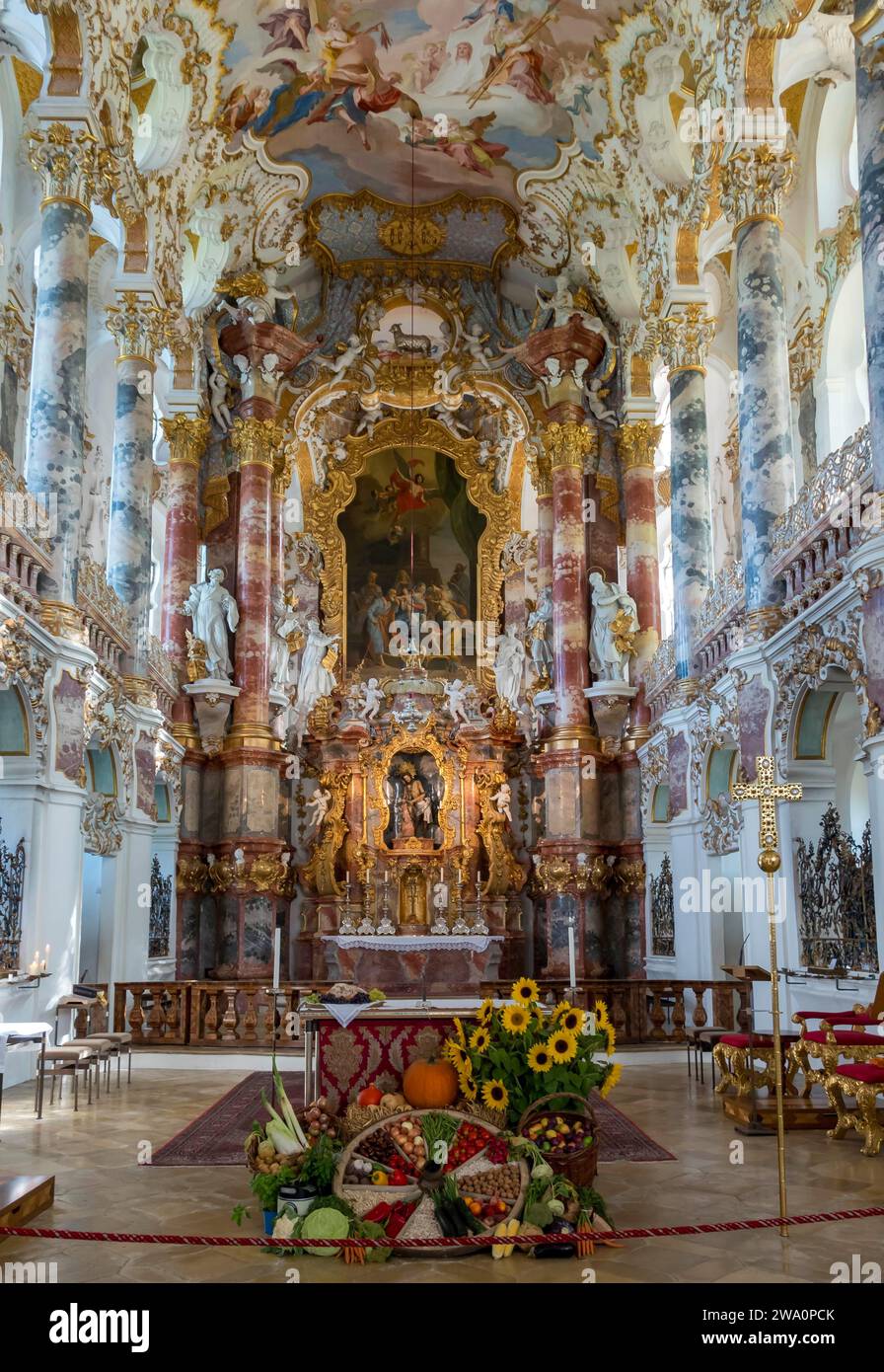 Chancel with Thanksgiving decorations, Pilgrimage Church of the Scourged Saviour, Wieskirche, Steingaden district, Pfaffenwinkel, Bavaria, Germany, Eu Stock Photo