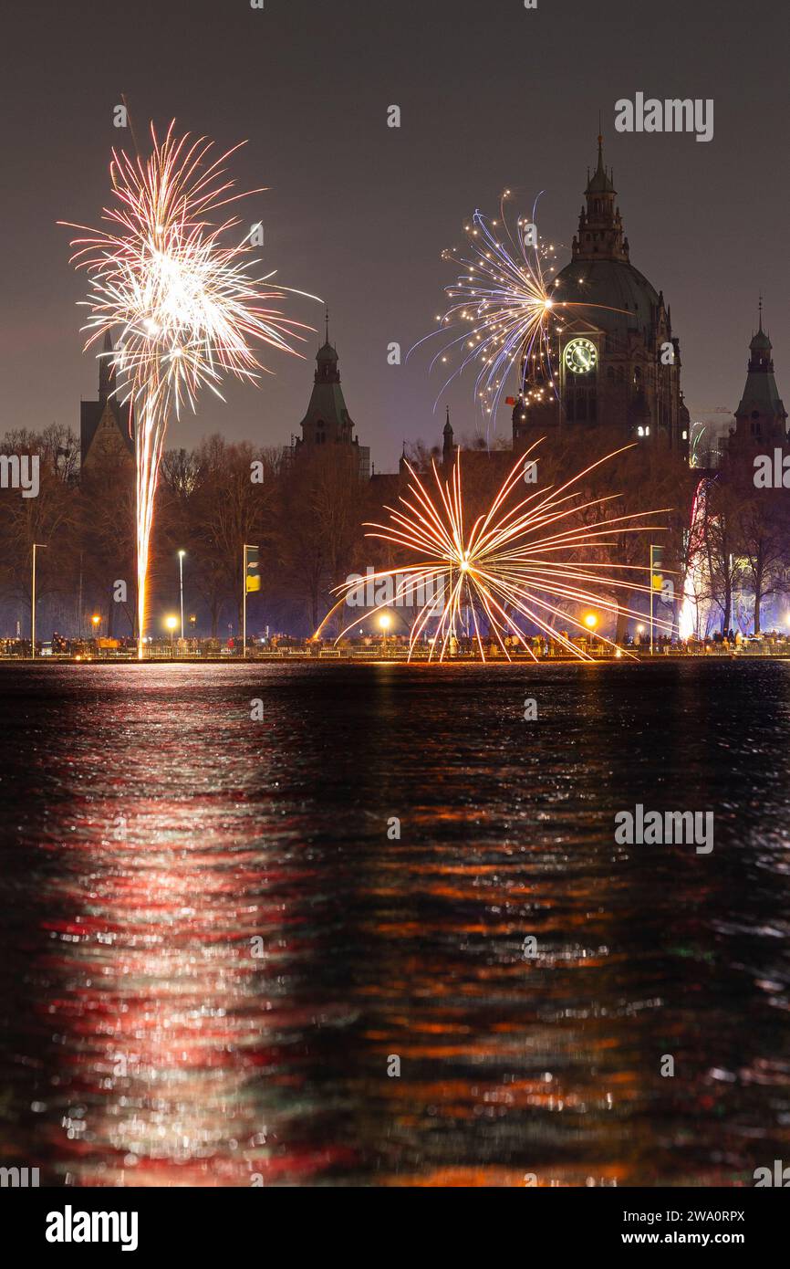 Hanover, Germany. 01st Jan, 2024. Fireworks explode in the sky above