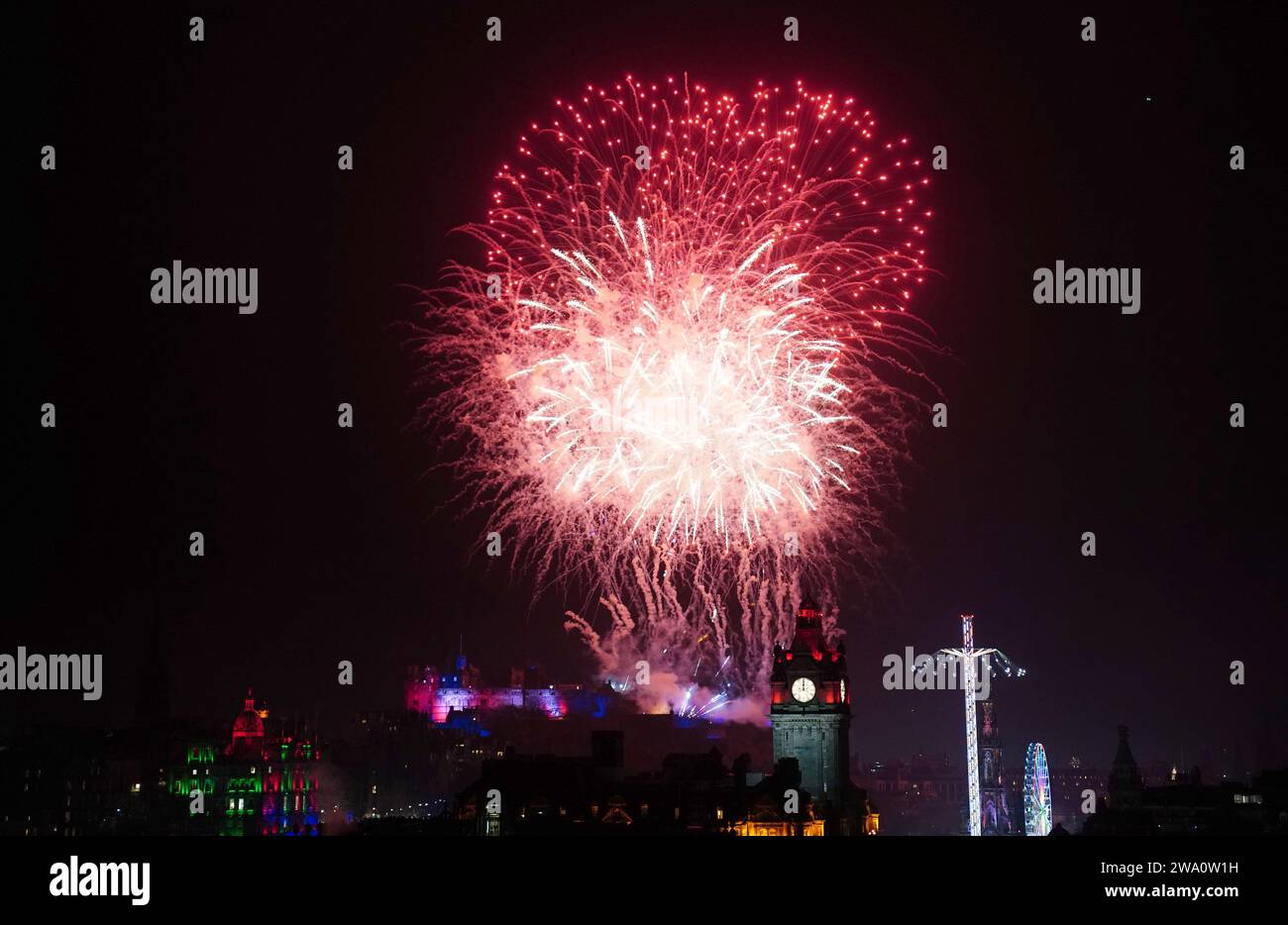 Fireworks explode over Edinburgh Castle during the street party for