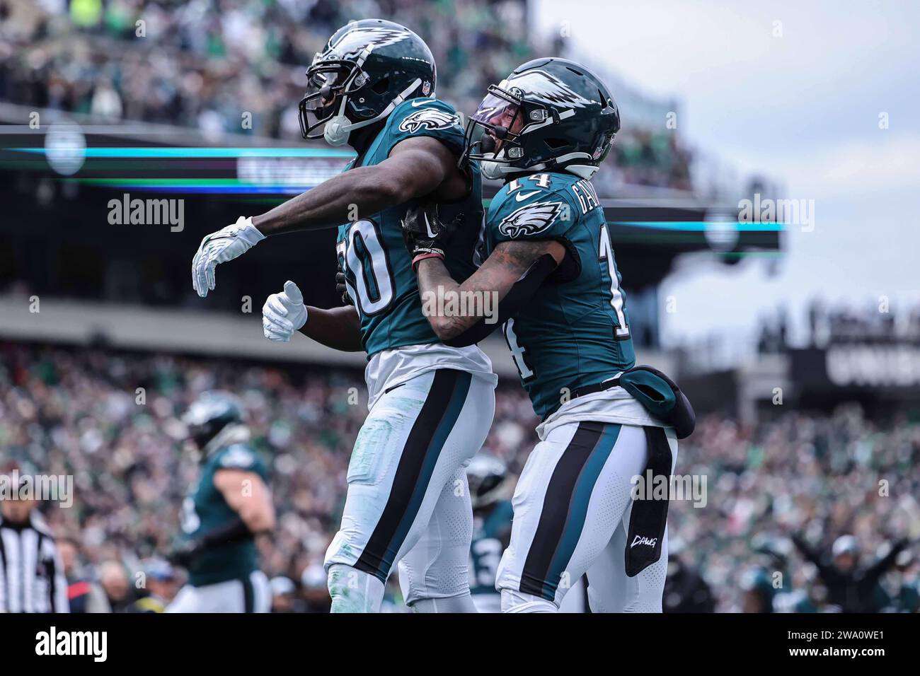 Philadelphia, PA, USA. 31st Dec, 2023. Philadelphia Eagles wide receiver JULIO JONES (80) and Philadelphia Eagles running back KENNETH GAINWELL (14) celebrated a touchdown during a week 17 game between the Philadelphia Eagles and the Arizona Cardinals Sunday, DEC 31, 2023; at Lincoln financial Field in Philadelphia, PA. (Credit Image: © Saquan Stimpson/ZUMA Press Wire) EDITORIAL USAGE ONLY! Not for Commercial USAGE! Credit: ZUMA Press, Inc./Alamy Live News Stock Photo