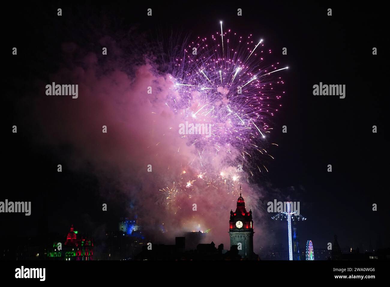 Fireworks explode over Edinburgh Castle during the street party for