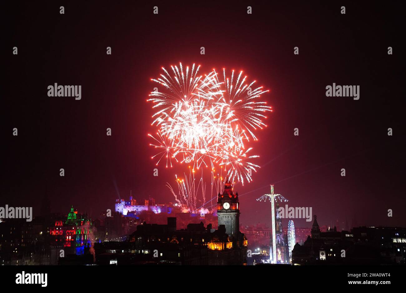 Fireworks explode over Edinburgh Castle during the street party for