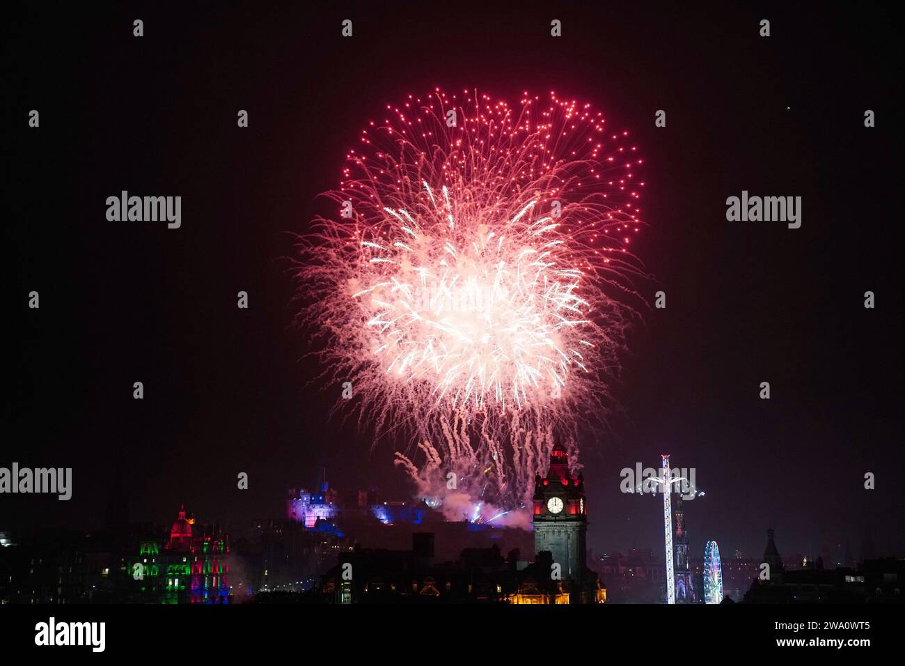 Fireworks explode over Edinburgh Castle during the street party for