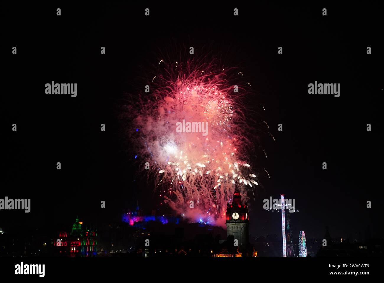 Fireworks explode over Edinburgh Castle during the street party for