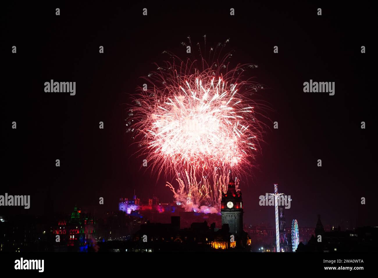 Fireworks explode over Edinburgh Castle during the street party for