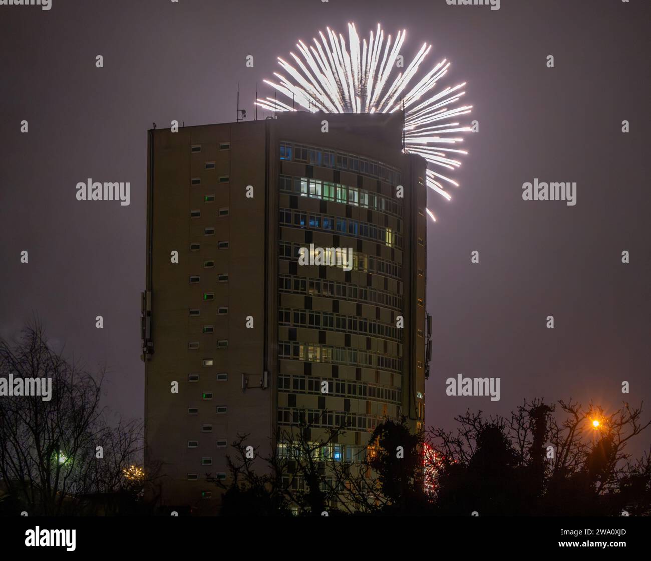 Merton, London, UK. 1st Jan, 2024. New Years Day fireworks burst around