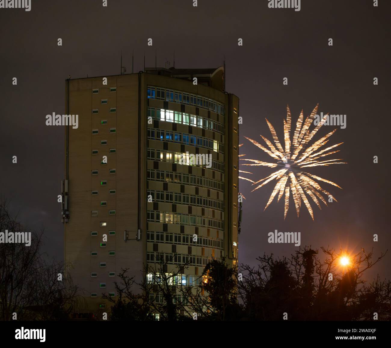 Merton, London, UK. 1st Jan, 2024. New Years Day fireworks burst around
