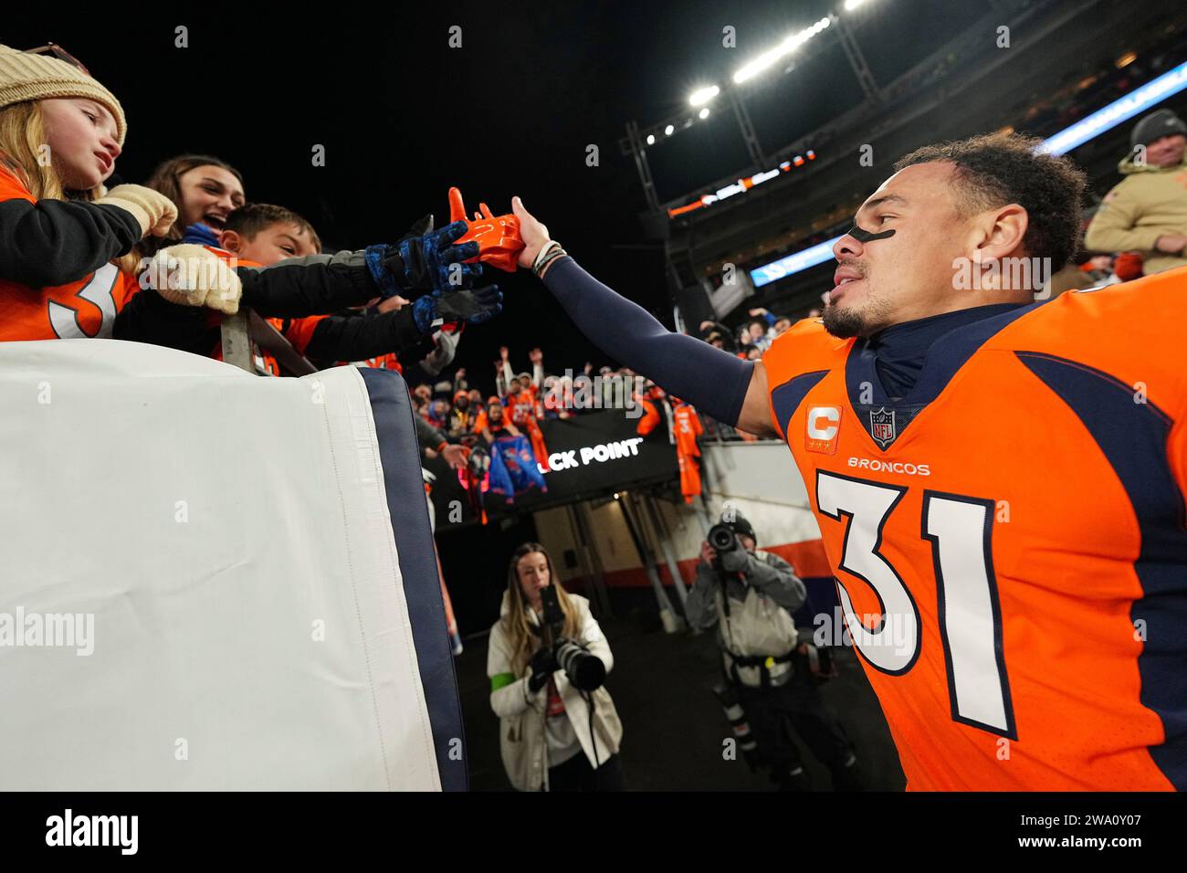 Denver Broncos safety Justin Simmons (31) leaves the field post game ...