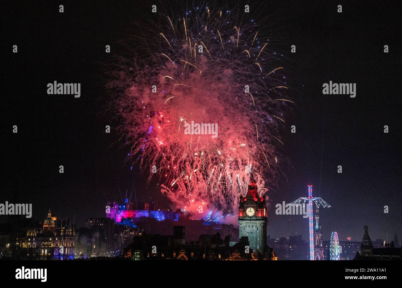 Fireworks explode over Edinburgh Castle during the street party for