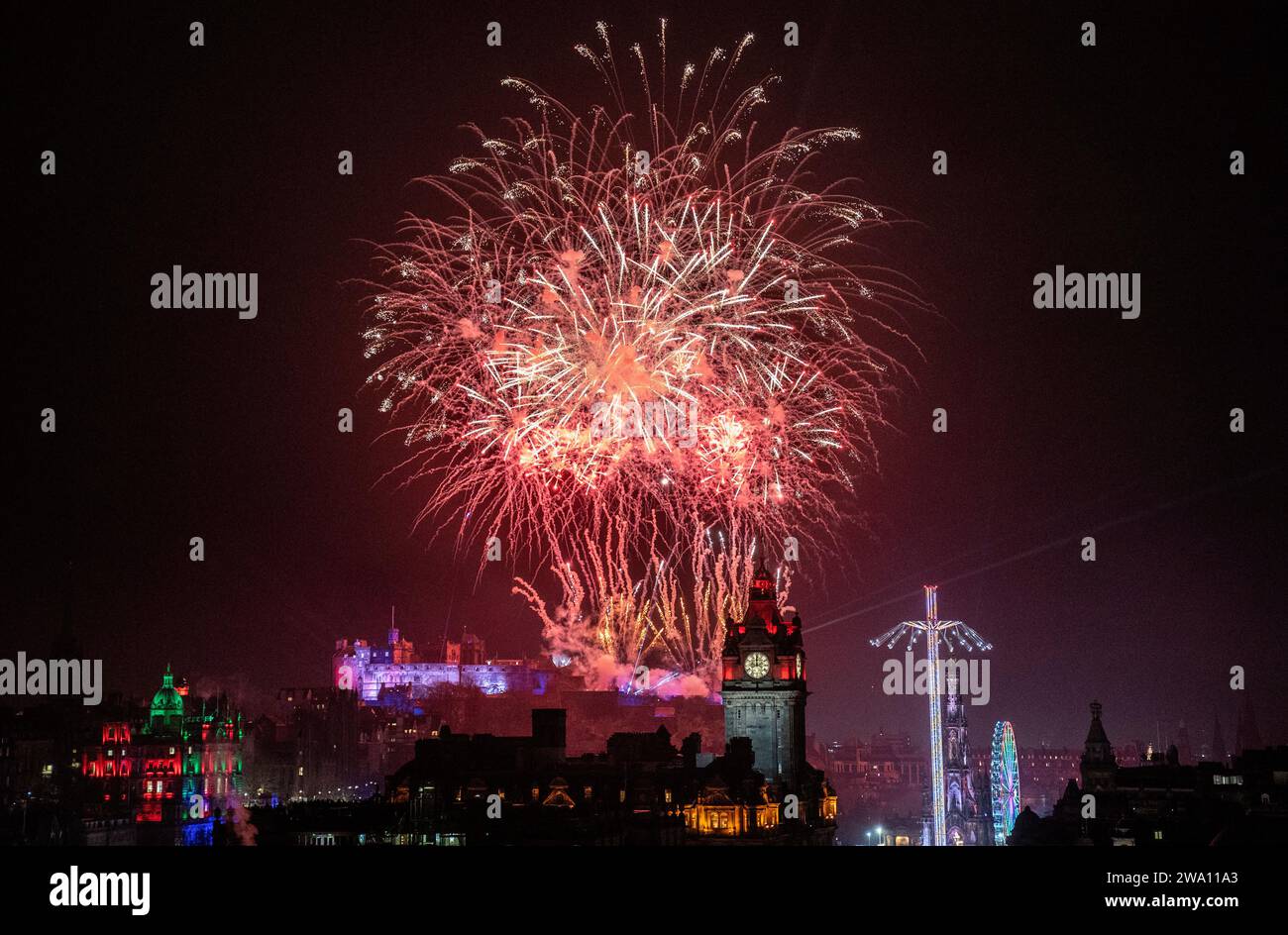 Fireworks explode over Edinburgh Castle during the street party for