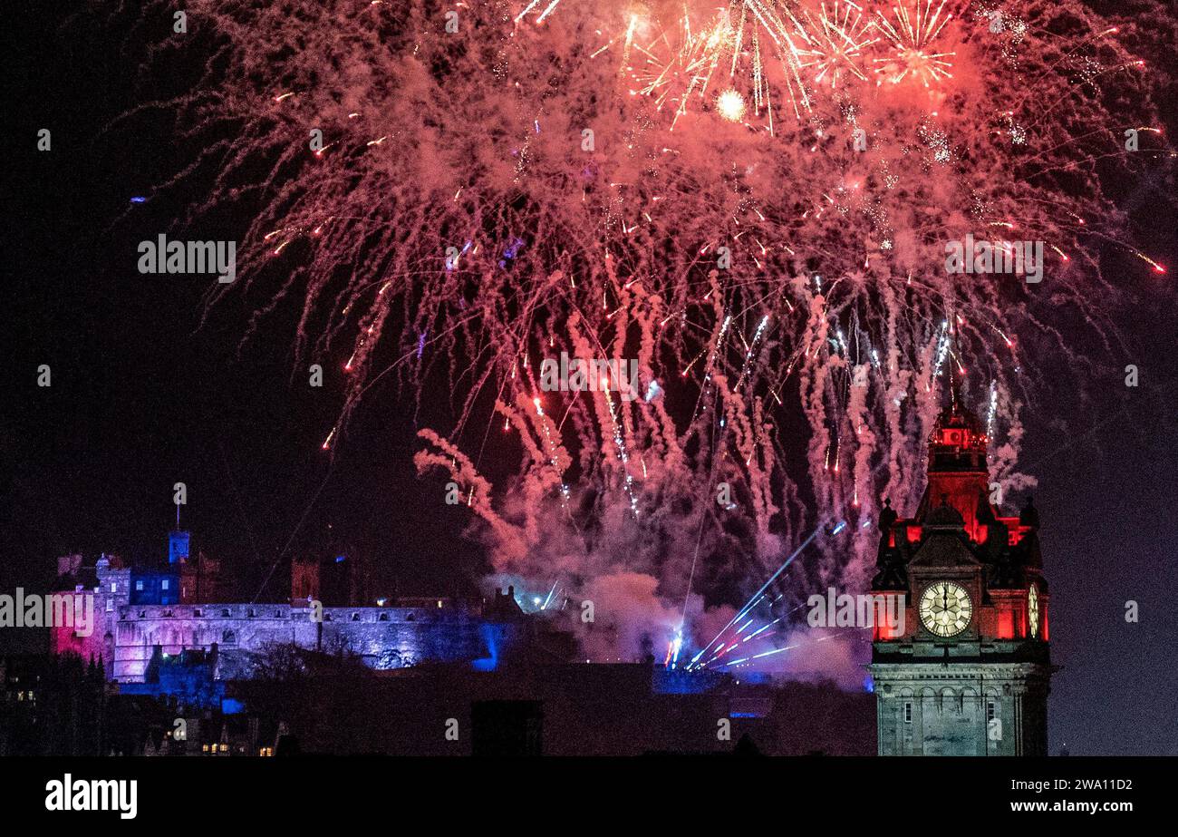 Fireworks explode over Edinburgh Castle and the Balmoral Clock during