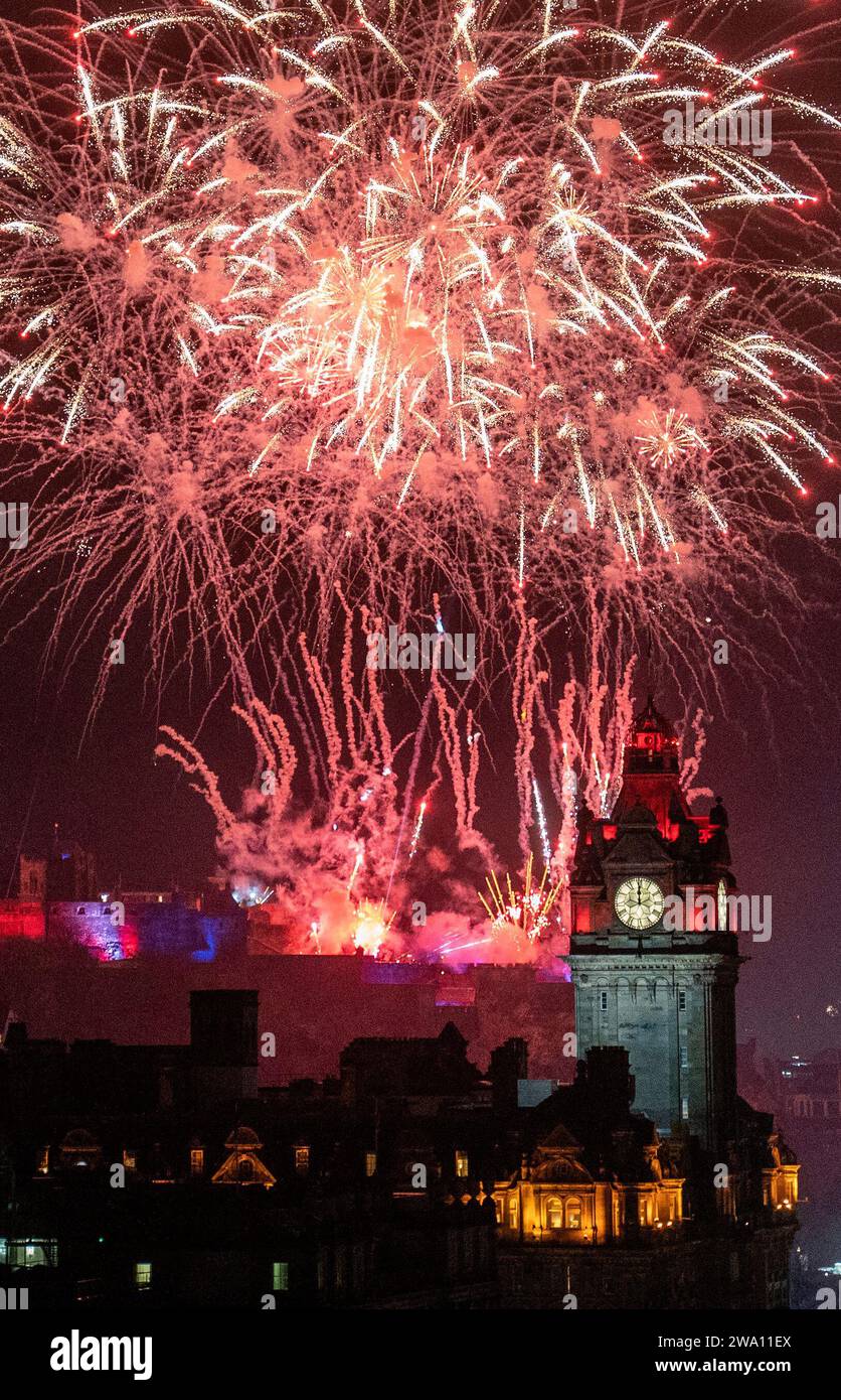 Fireworks explode over Edinburgh Castle and the Balmoral Clock during