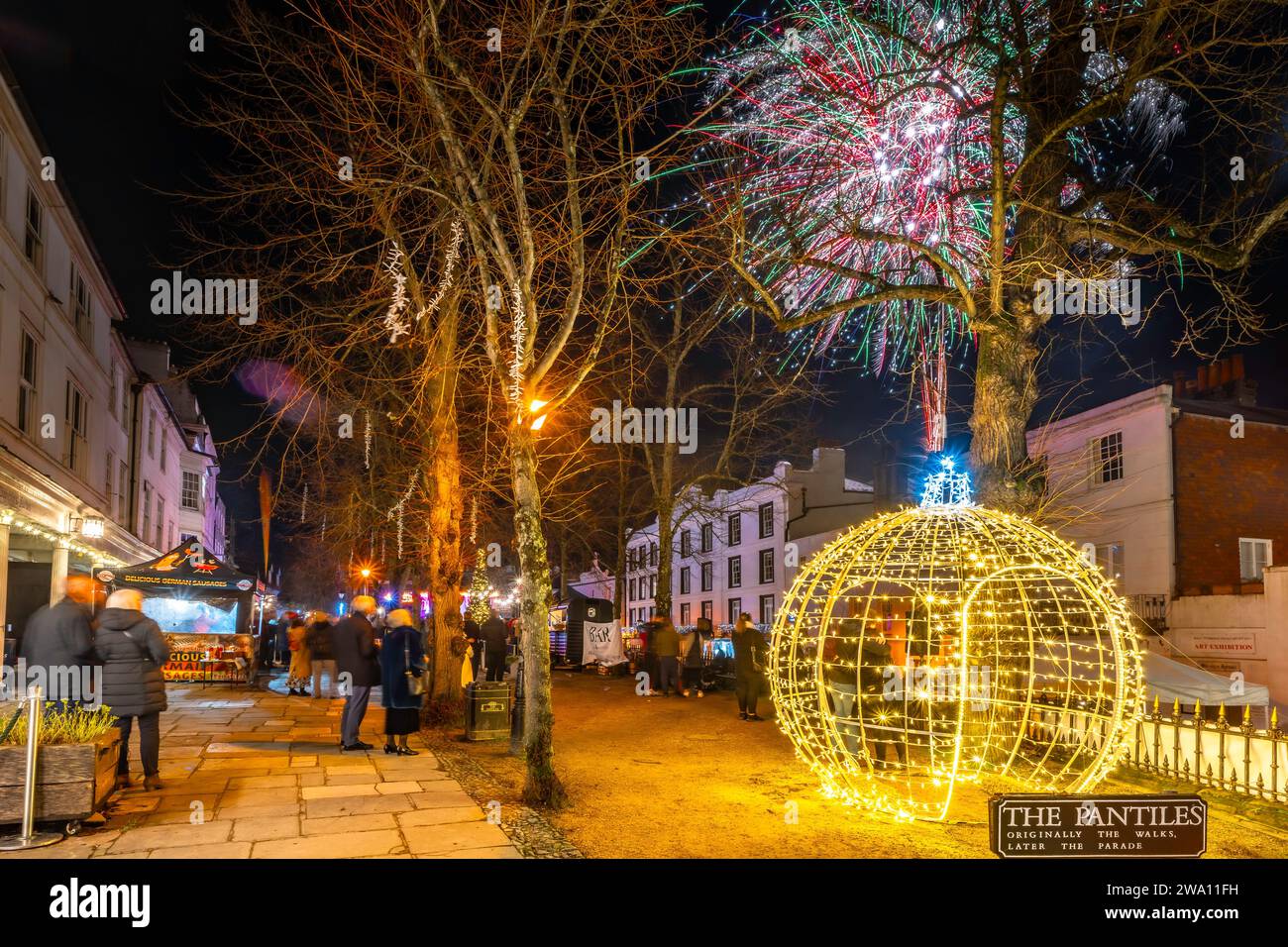 The Pantiles, Royal Tunbridge Wells, Kent, England. 31 December 2023. The historic Royal town of Tunbridge Wells turns out for the organised celbrations on The Pantiles, with a  firework display at midnight that attracts large crowds to welcome in the new year 2024. ©Sarah Mott / Alamy Live News. Stock Photo