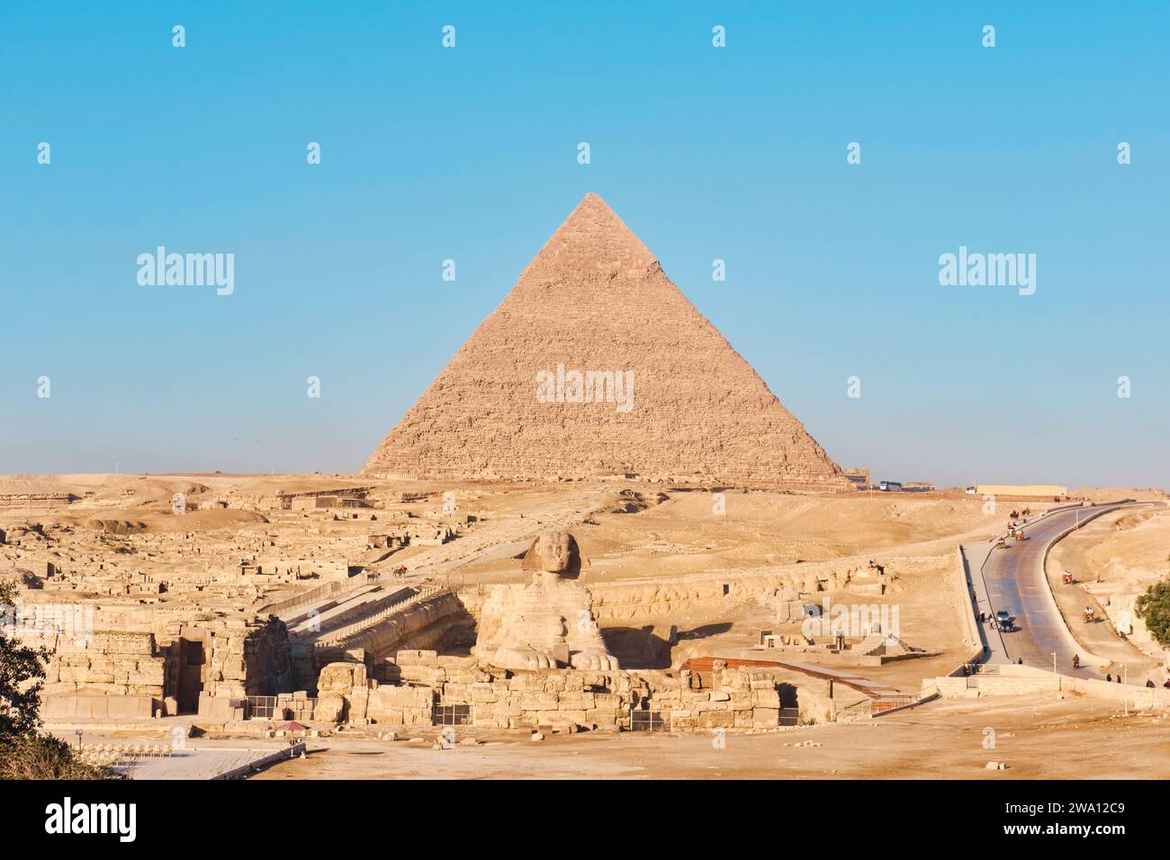 Giza, Egypt - December 24 2023: Sphinx and Pyramid of Khafre (Kefren) on Giza plateau, Cairo Stock Photo