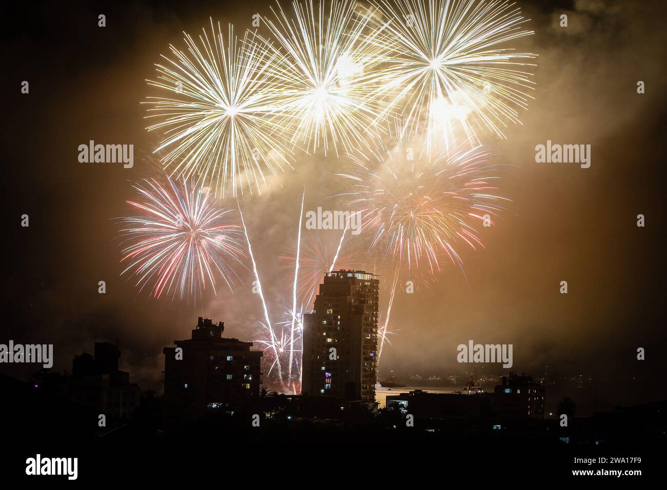 Valparaiso, Chile. 01st Jan, 2024. Fireworks illuminate the coast of