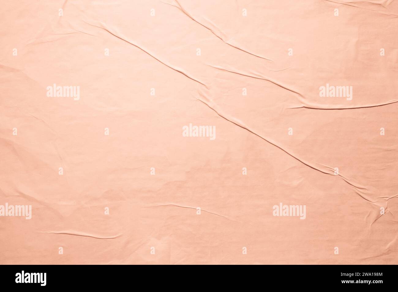 Glued peach color paper poster texture background Stock Photo