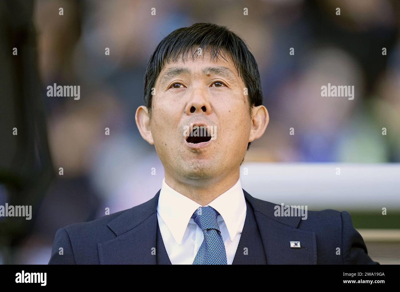 japan-head-coach-hajime-moriyasu-sings-the-national-anthem-ahead-of-an