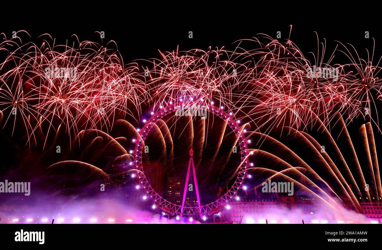 London, Britain. 1st Jan, 2024. Fireworks explode to celebrate the New